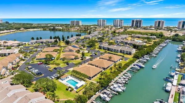 an aerial view of a city with lake view