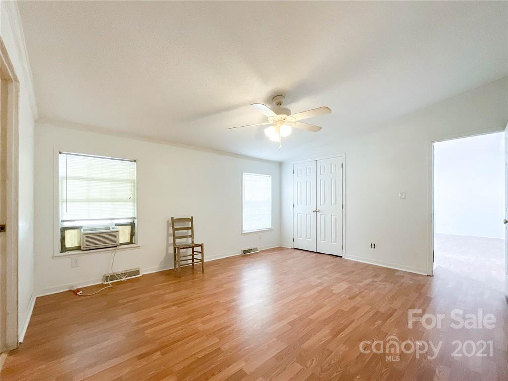 3512 Edwards Road Wingate, NC 28174 - Photo 26 of 42 wooden floor in an empty room with a window