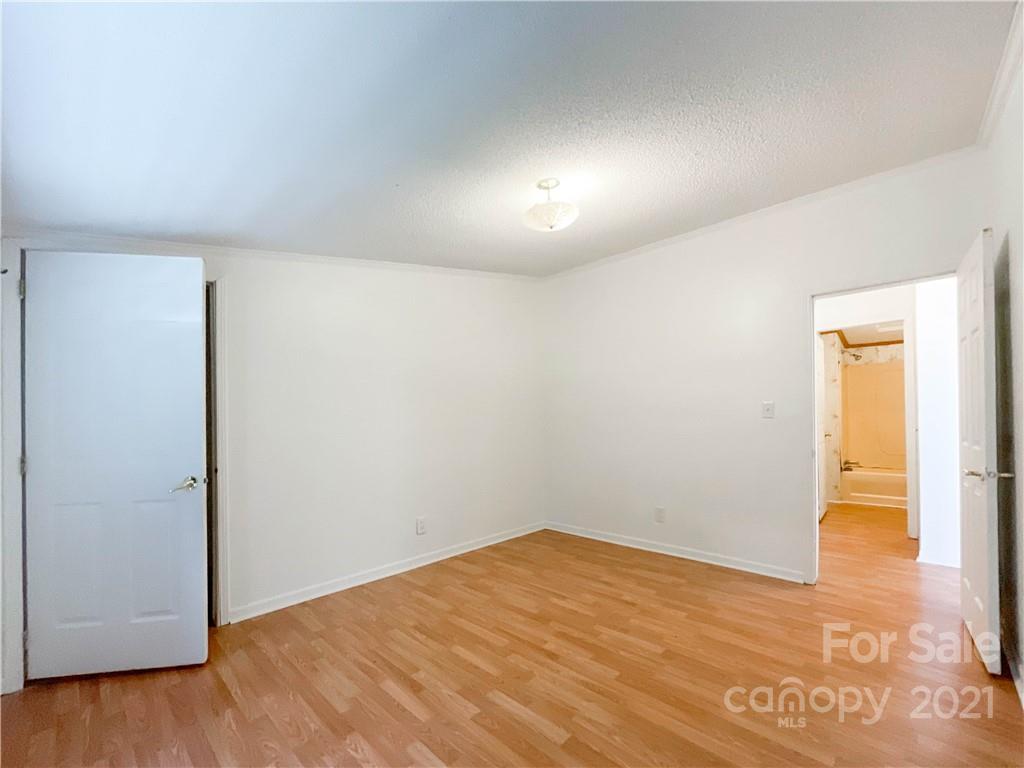 3512 Edwards Road Wingate, NC 28174 - Photo 32 of 42 a view of empty room with wooden floor
