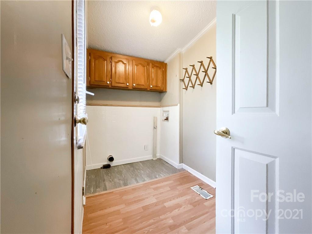 3512 Edwards Road Wingate, NC 28174 - Photo 36 of 42 a view of a livingroom with wooden floor and entryway