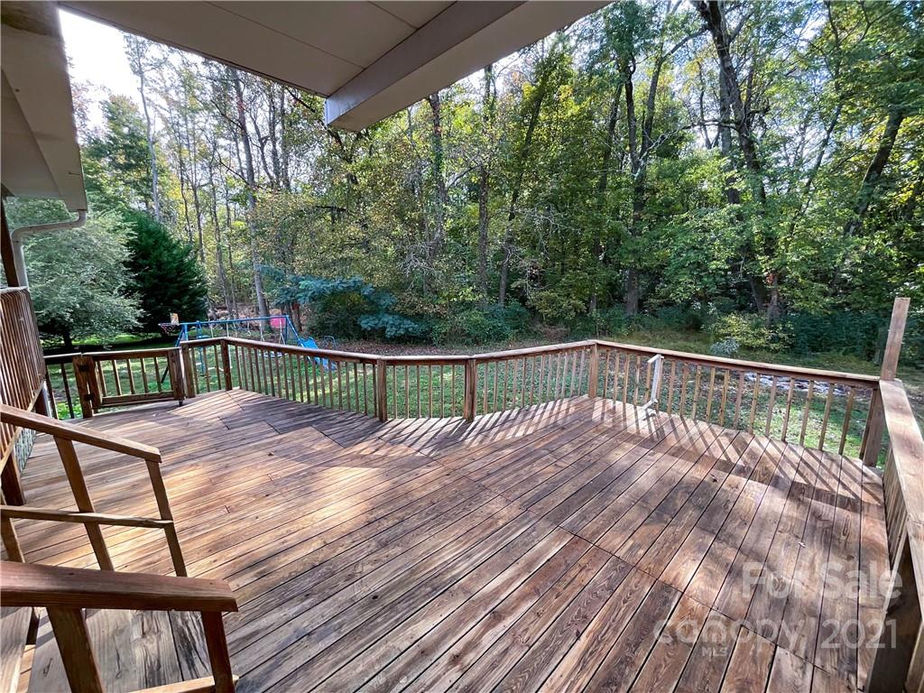 3512 Edwards Road Wingate, NC 28174 - Photo 38 of 42 a view of backyard with deck and trees