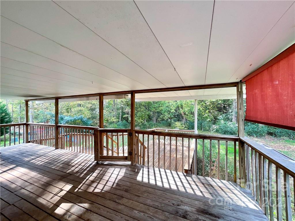 3512 Edwards Road Wingate, NC 28174 - Photo 39 of 42 a view of a balcony with wooden floor