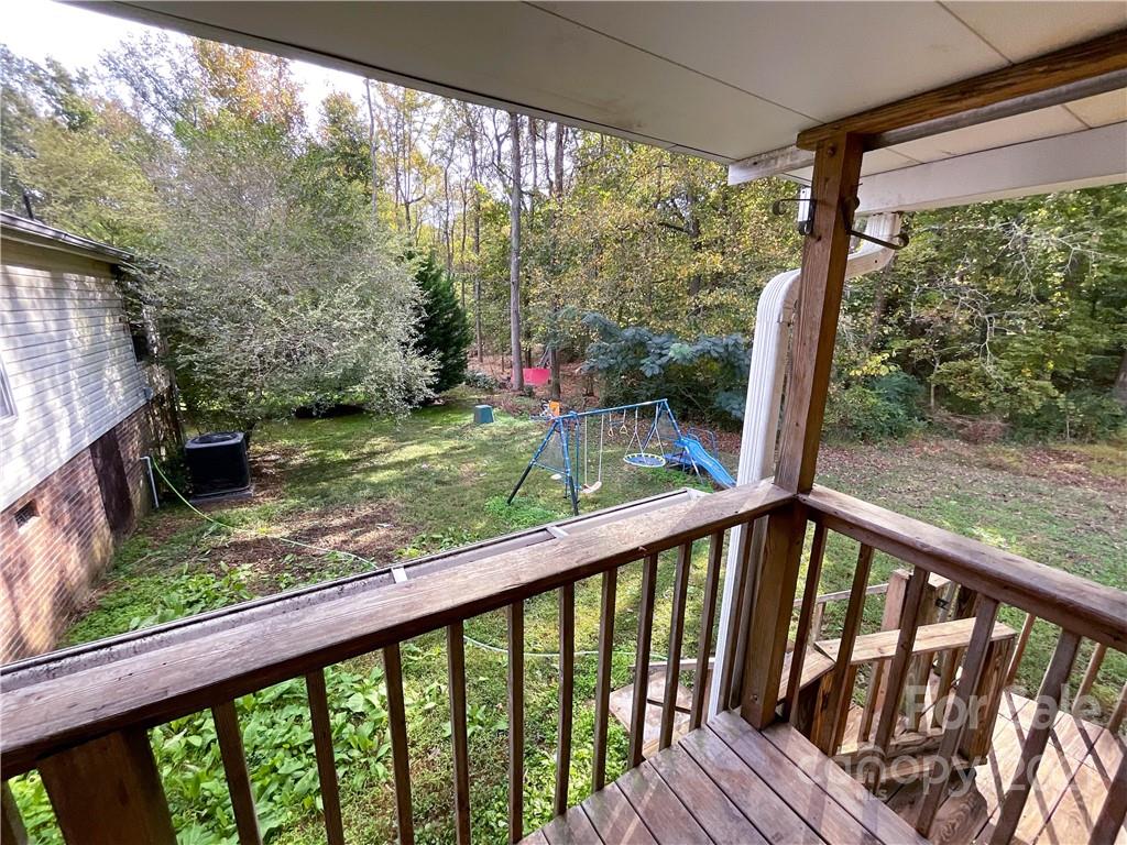 3512 Edwards Road Wingate, NC 28174 - Photo 42 of 42 a view of porch with a small deck