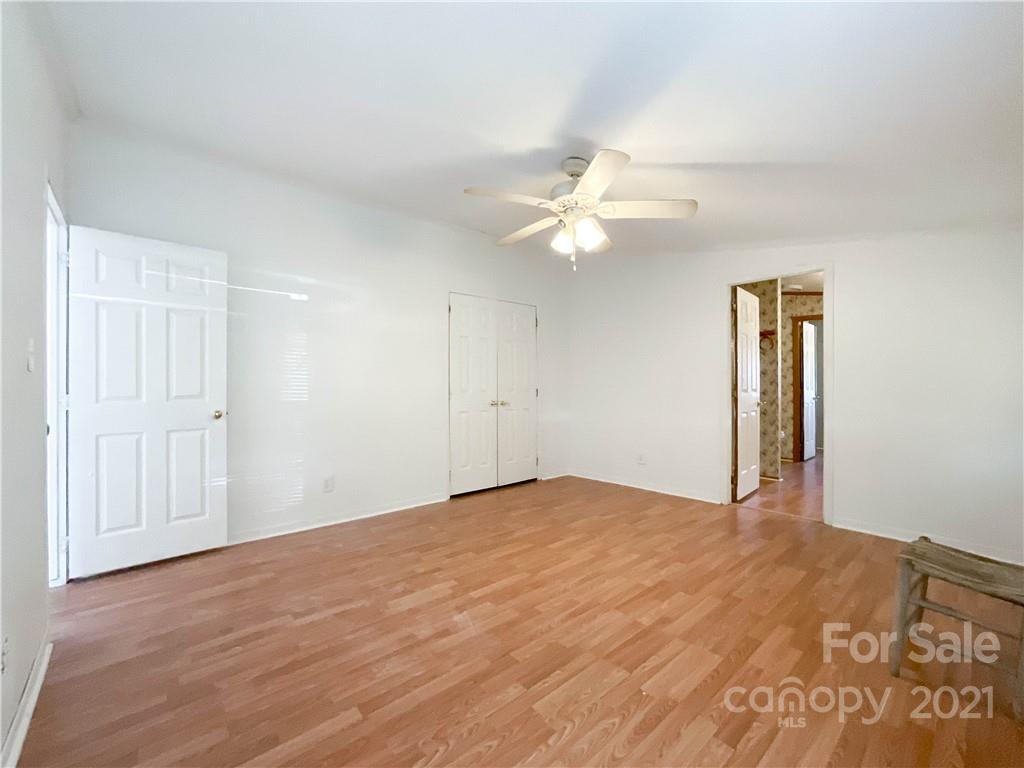 3512 Edwards Road Wingate, NC 28174 - Photo 9 of 42 a view of an empty room with a window