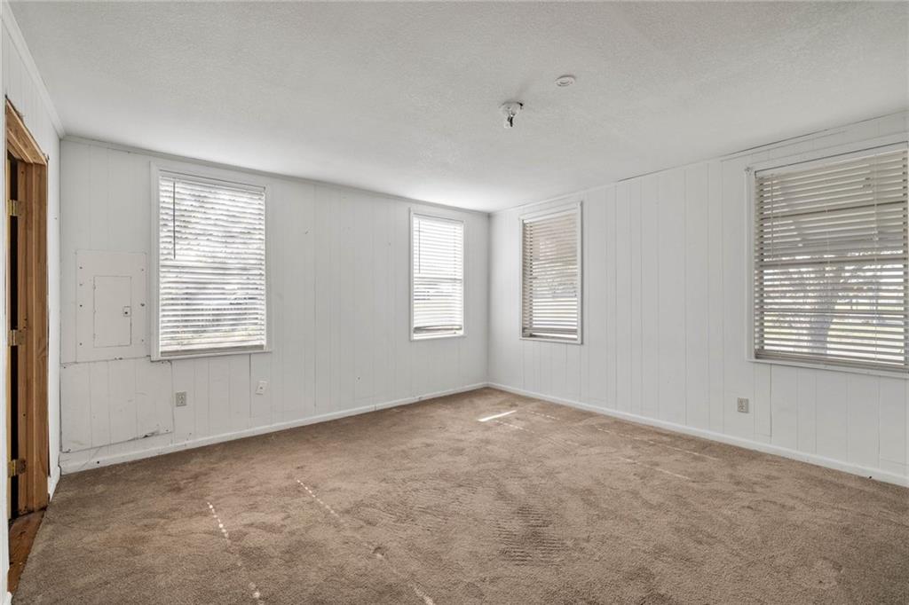 211 7th Street Jarrell, TX 76537 - Photo 17 of 26 a view of an empty room with a window