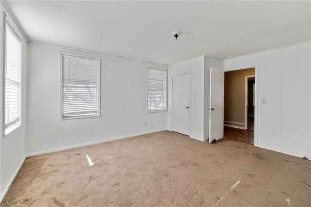 an empty room with windows