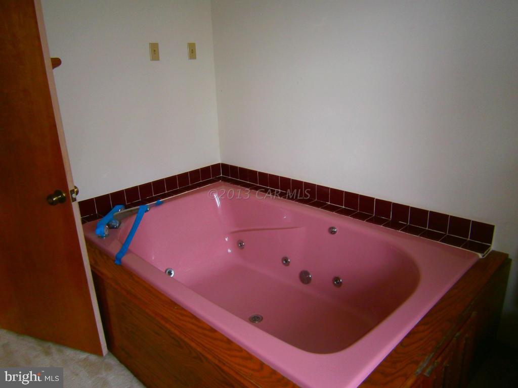 35320 Tingle Road Willards, MD 21874 - Photo 11 of 14 a blue bed with white walls