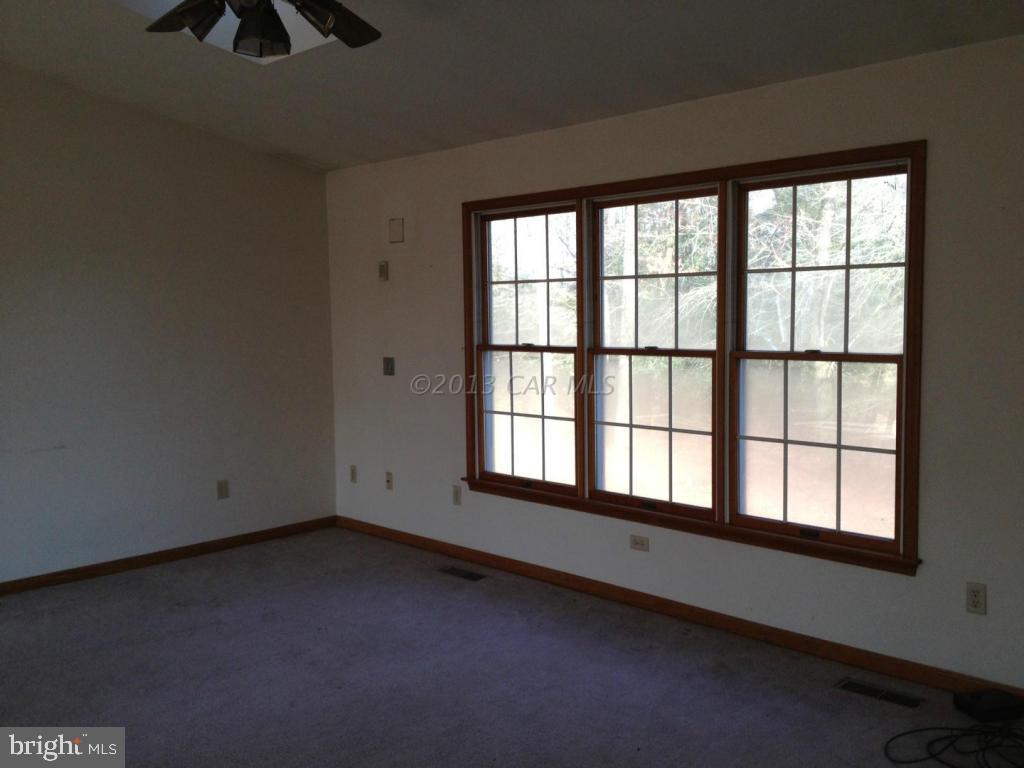 35320 Tingle Road Willards, MD 21874 - Photo 3 of 14 an empty room with a window