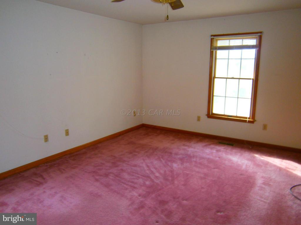 35320 Tingle Road Willards, MD 21874 - Photo 7 of 14 an empty room with a window