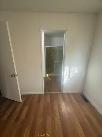 a view of livingroom with hardwood floor and window