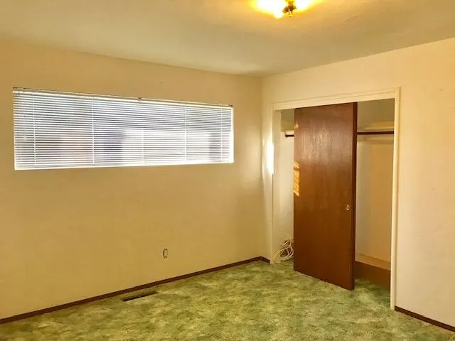 a view of an empty room with window