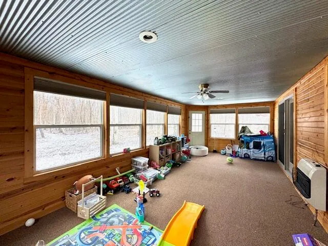 a very nice looking room with furniture and a large window