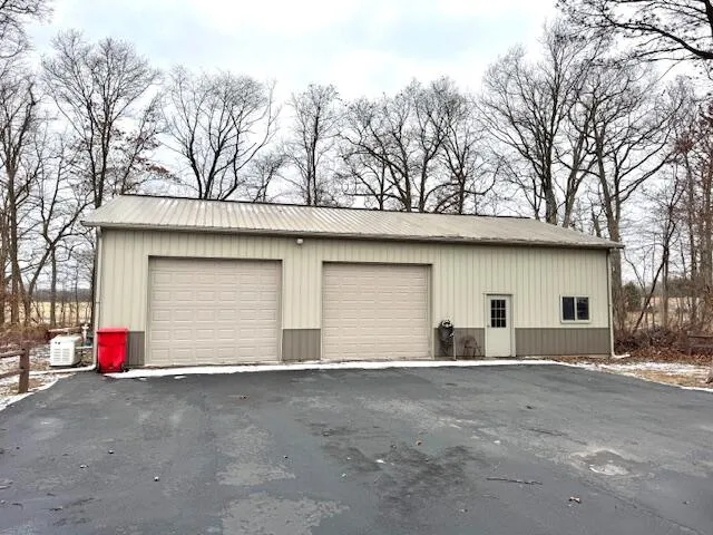 a house with trees in the background