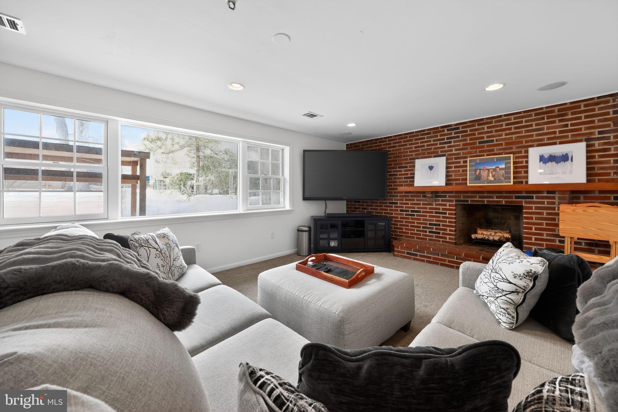 123 Pearl Croft Road Cherry Hill, NJ 08034 - Photo 12 of 41 Cozy living space with inviting brick accents.