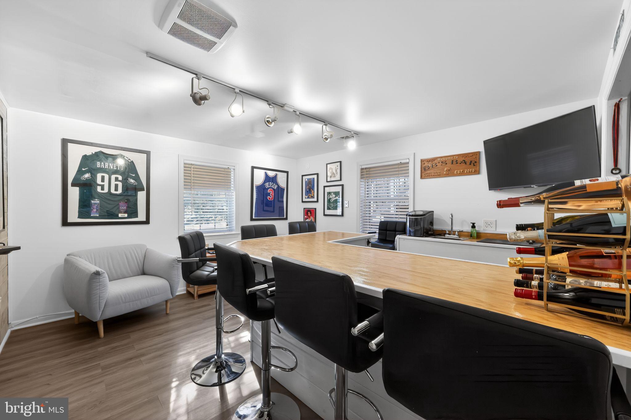 123 Pearl Croft Road Cherry Hill, NJ 08034 - Photo 23 of 41 Modern entertainment space with sports memorabi...