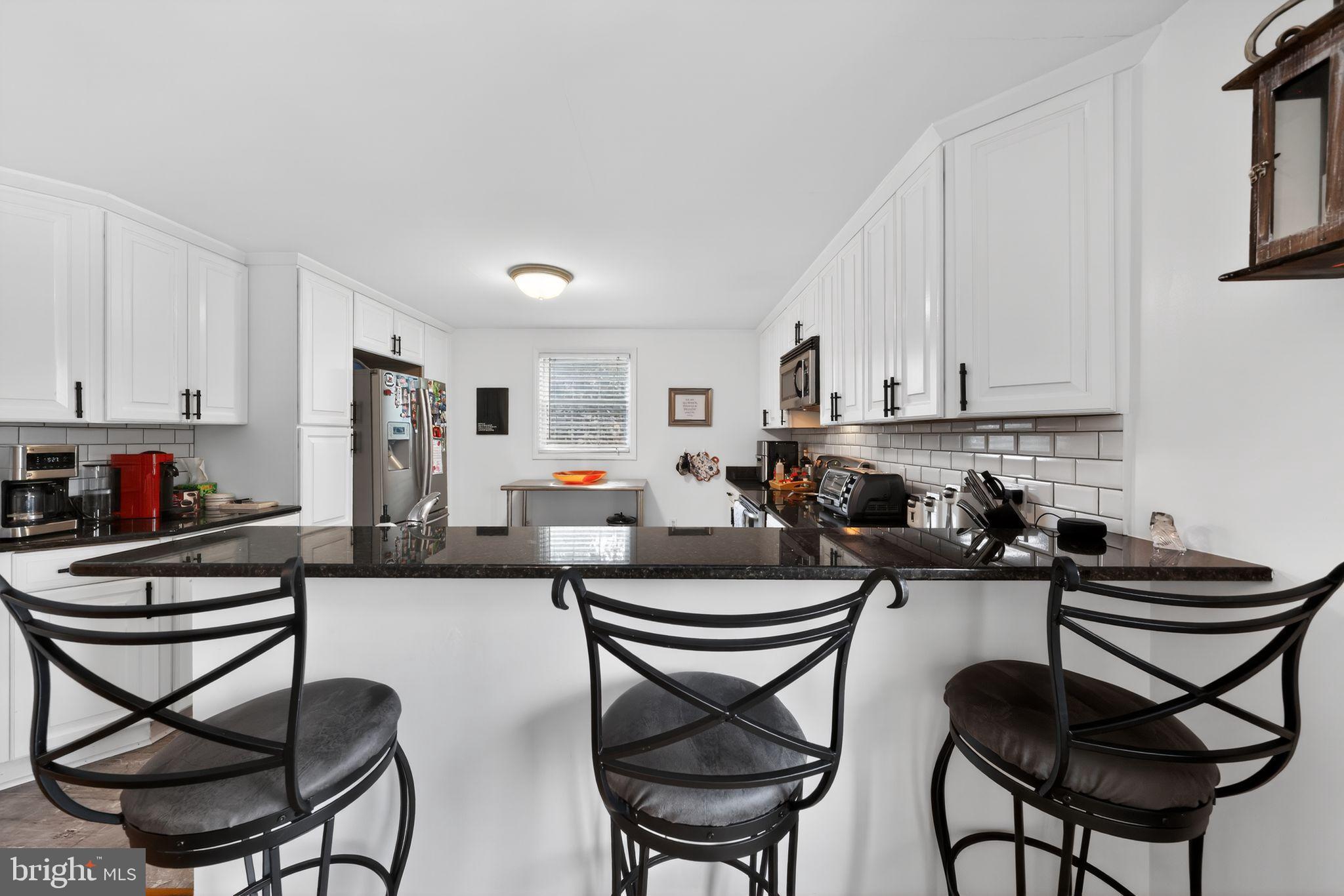123 Pearl Croft Road Cherry Hill, NJ 08034 - Photo 7 of 41 Modern kitchen with sleek design elements.