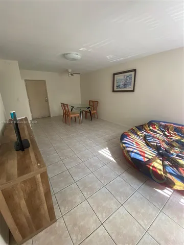 a bedroom with furniture and a table