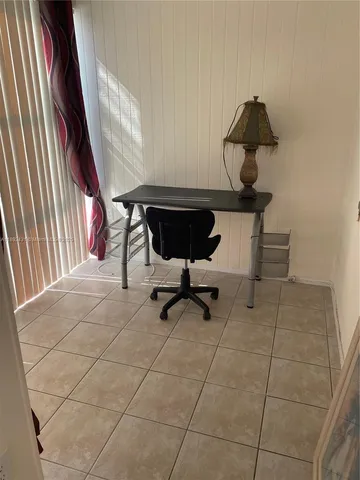 a kitchen with stainless steel appliances a stove a sink and a refrigerator