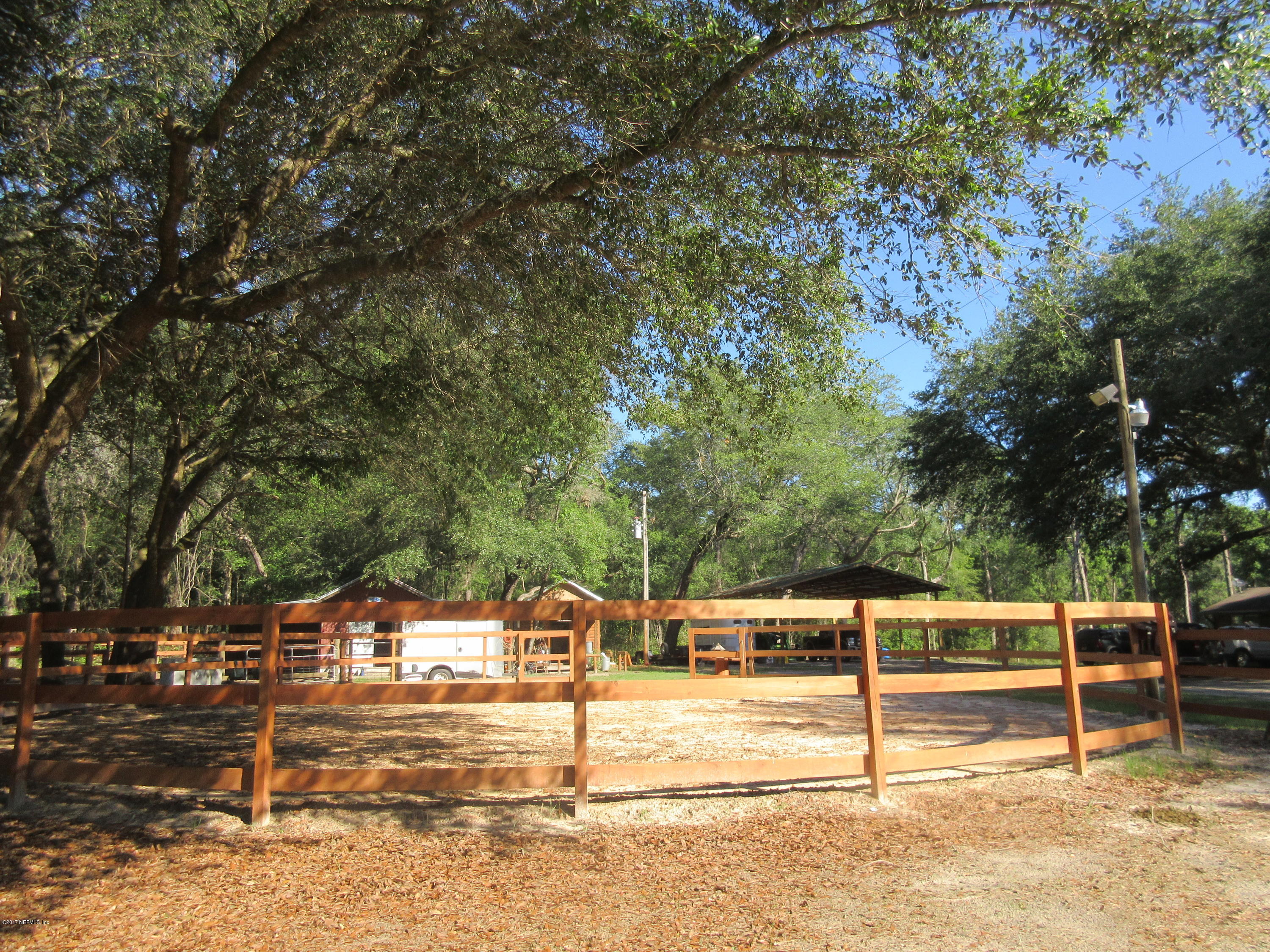 5824 Jones Creek Road Keystone Heights, FL 32656 - Photo 15 of 19 a view of a parking space with trees