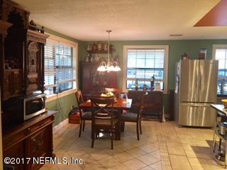 5824 Jones Creek Road Keystone Heights, FL 32656 - Photo 4 of 19 a view of a dining room with furniture window and outside view