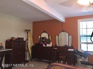 5824 Jones Creek Road Keystone Heights, FL 32656 - Photo 7 of 19 a view of a double door and bedroom
