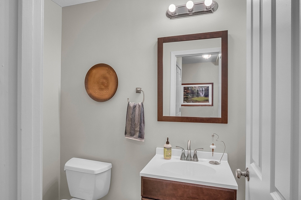 862 Reservoir Road Lunenburg, MA 01462 - Photo 16 of 37 a bathroom with a toilet and a sink