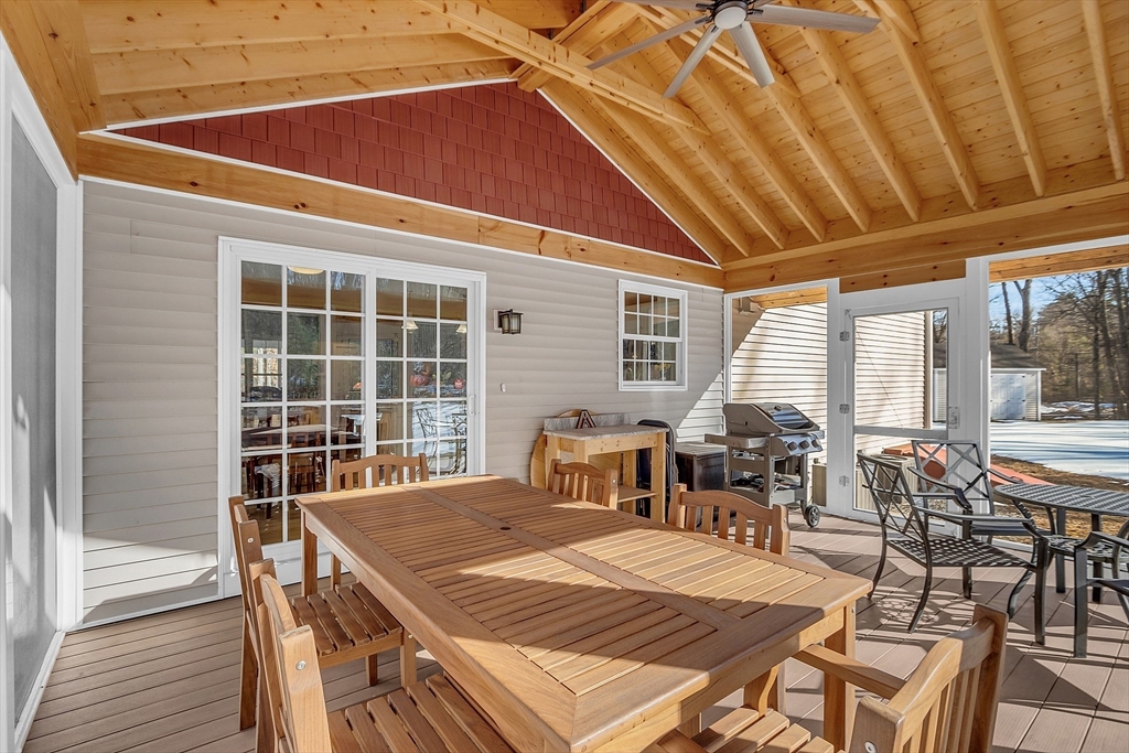 862 Reservoir Road Lunenburg, MA 01462 - Photo 33 of 37 a dinning table and chairs in patio of the house