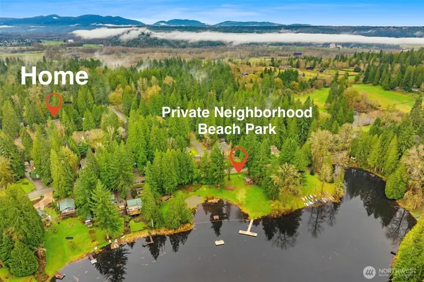 a view of a lake with a yard