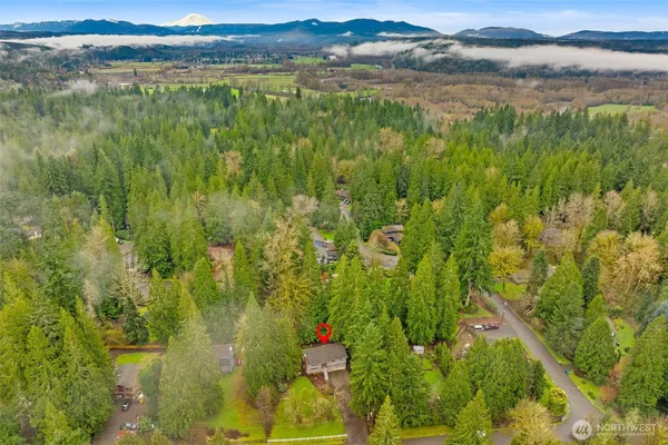 a view of lake with green space