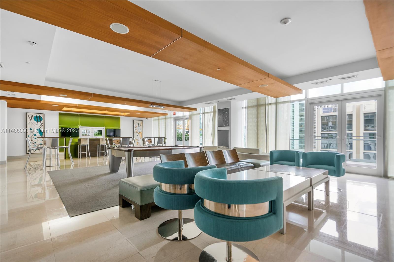 500 Brickell Avenue, Unit 2602 Miami, FL 33131 - Photo 34 of 38 a living room with fireplace furniture and a large window