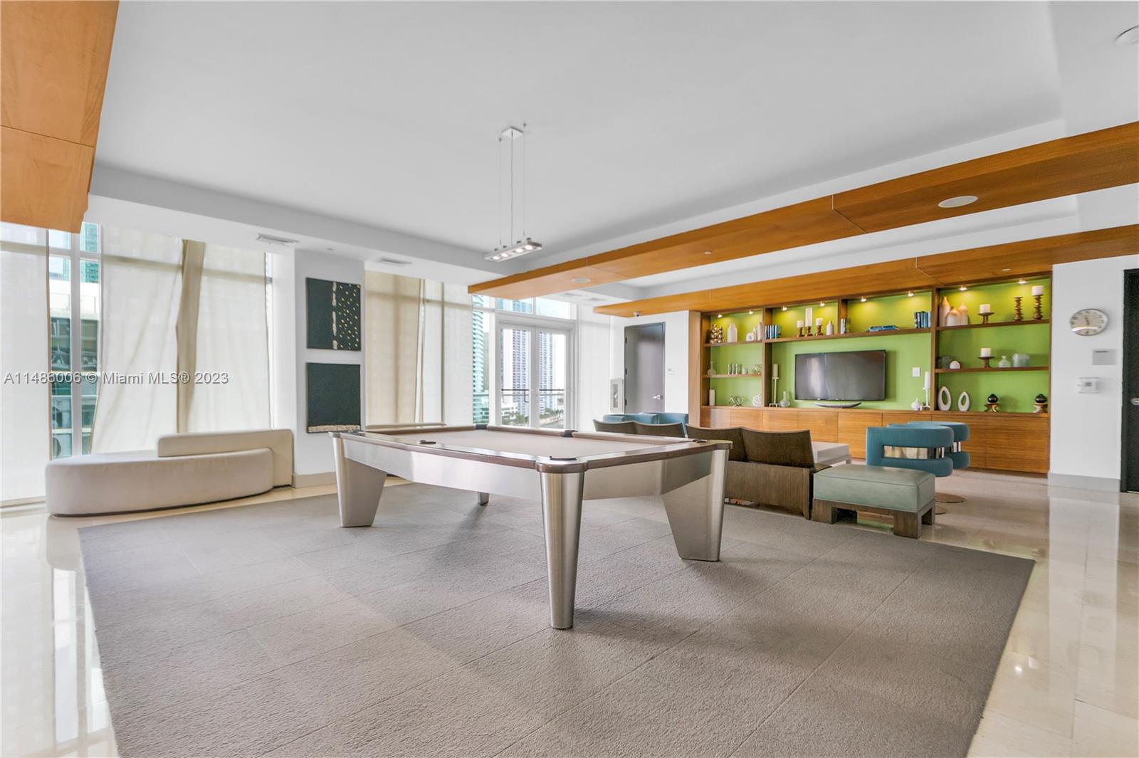 500 Brickell Avenue, Unit 2602 Miami, FL 33131 - Photo 35 of 38 a living room with furniture and large windows