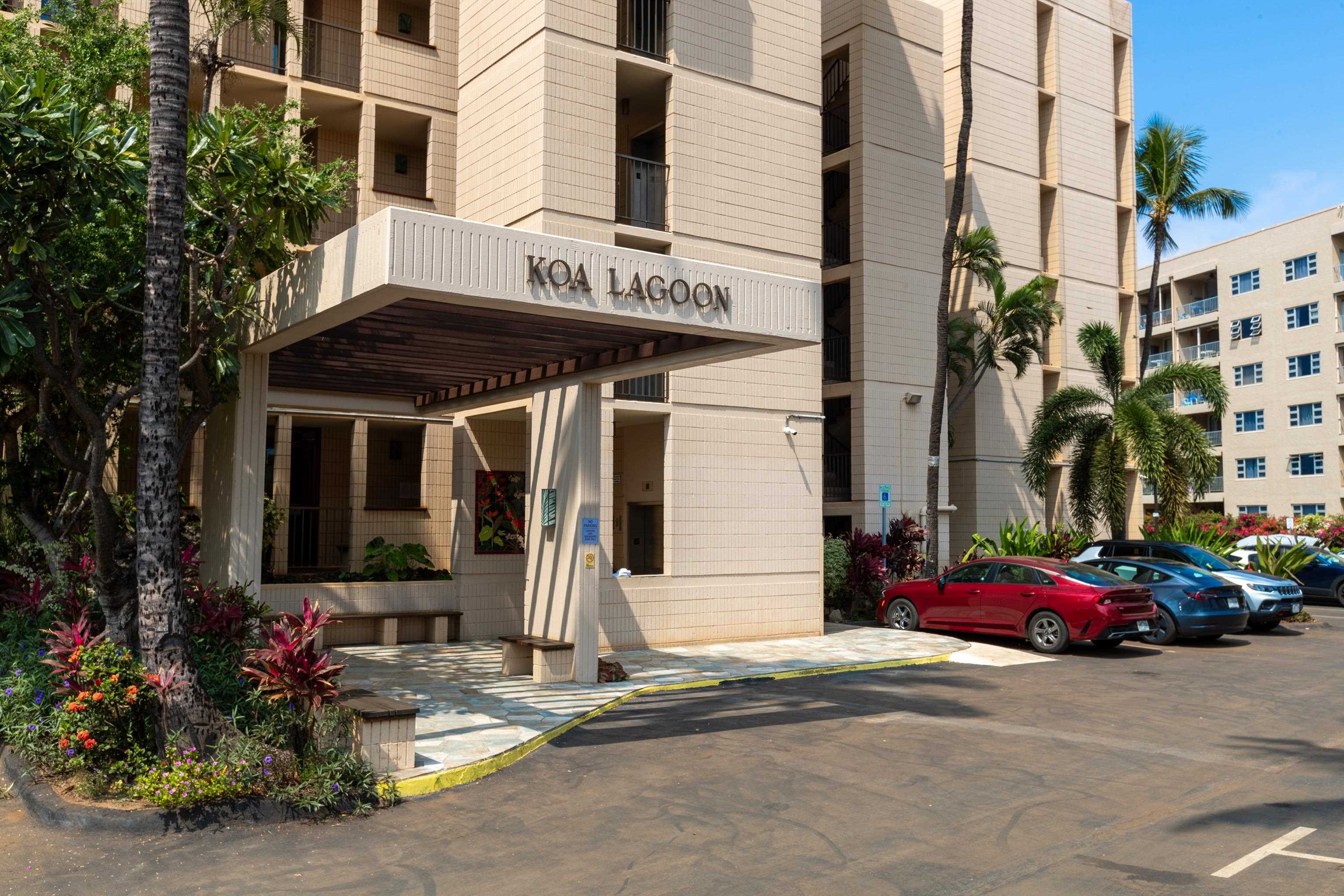 800 South Kihei Road, Unit 302 Kihei, HI 96753 - Photo 42 of 50 a view of a building with street sign and a lawn chairs