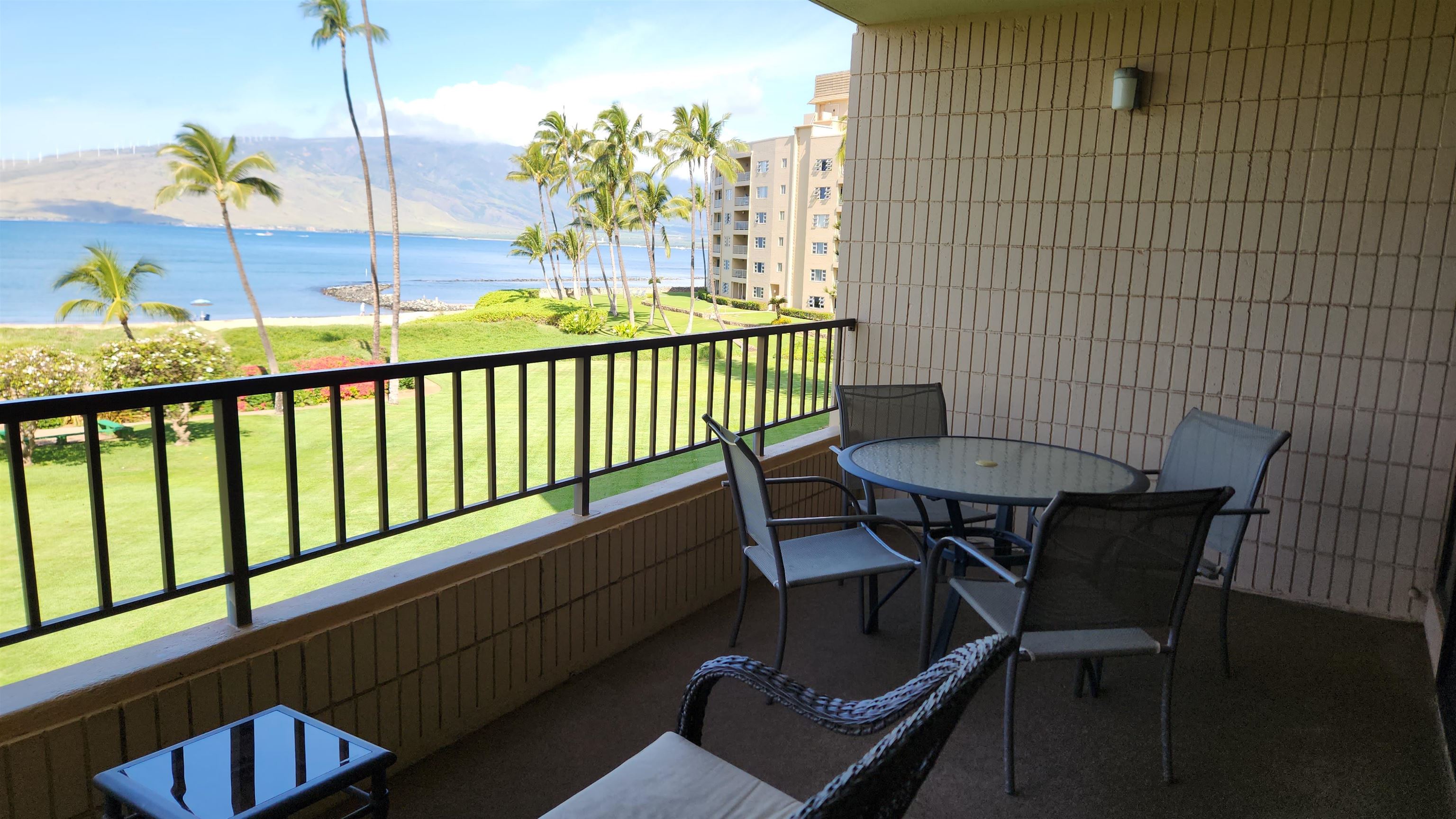 800 South Kihei Road, Unit 302 Kihei, HI 96753 - Photo 9 of 50 a view of a chairs and table in the balcony
