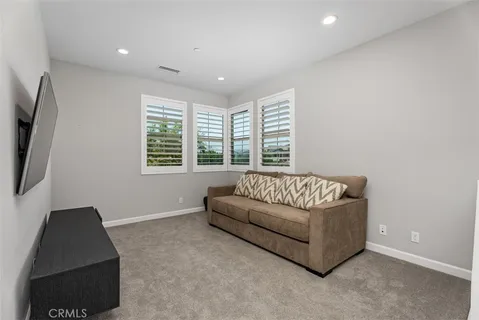 a large living room with a large window
