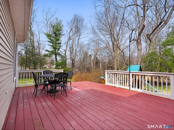 a view of a backyard with a deck