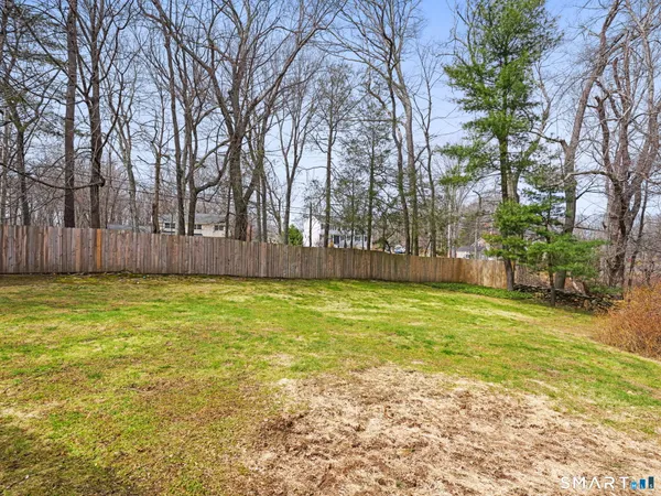 a view of swimming pool with trees in the background