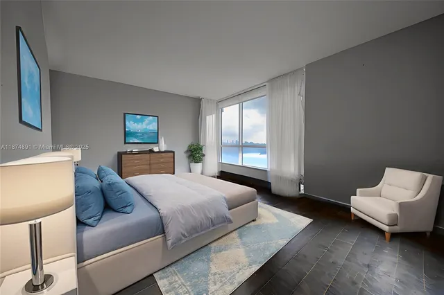 a bedroom with a bed and a couch