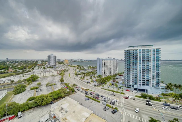 a view of a city with tall buildings