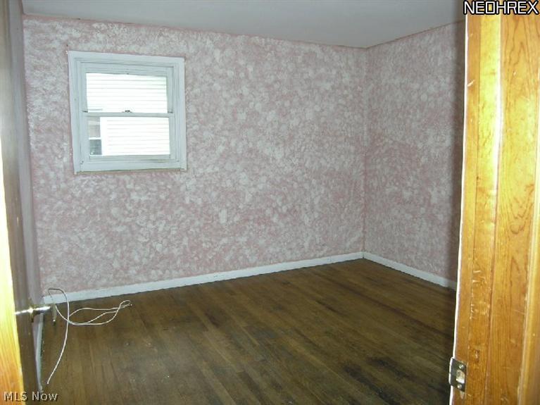 4789 North Ridge Road East Geneva, OH 44041 - Photo 9 of 14 Bedroom in brick house