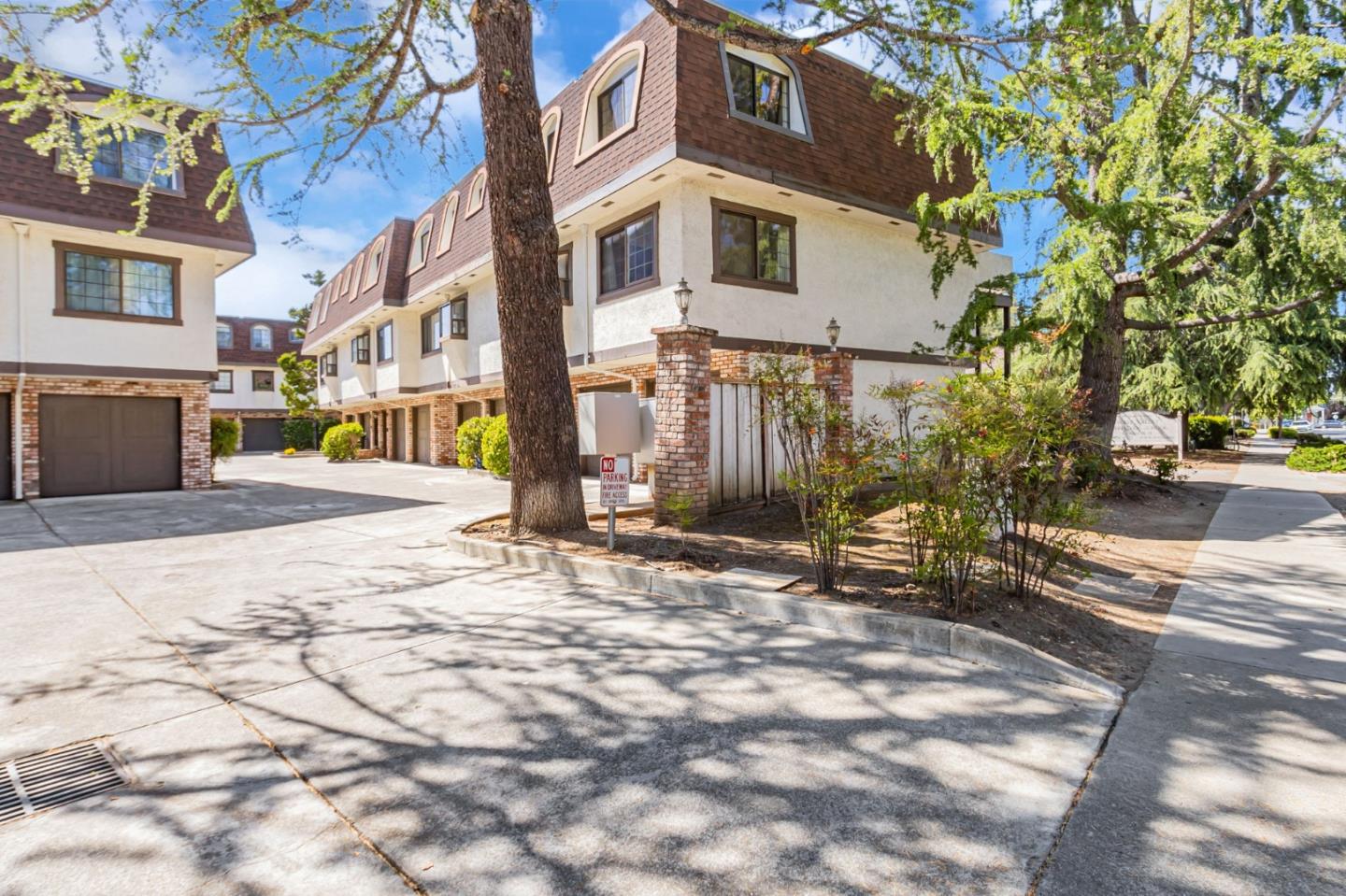 a view of a street with houses