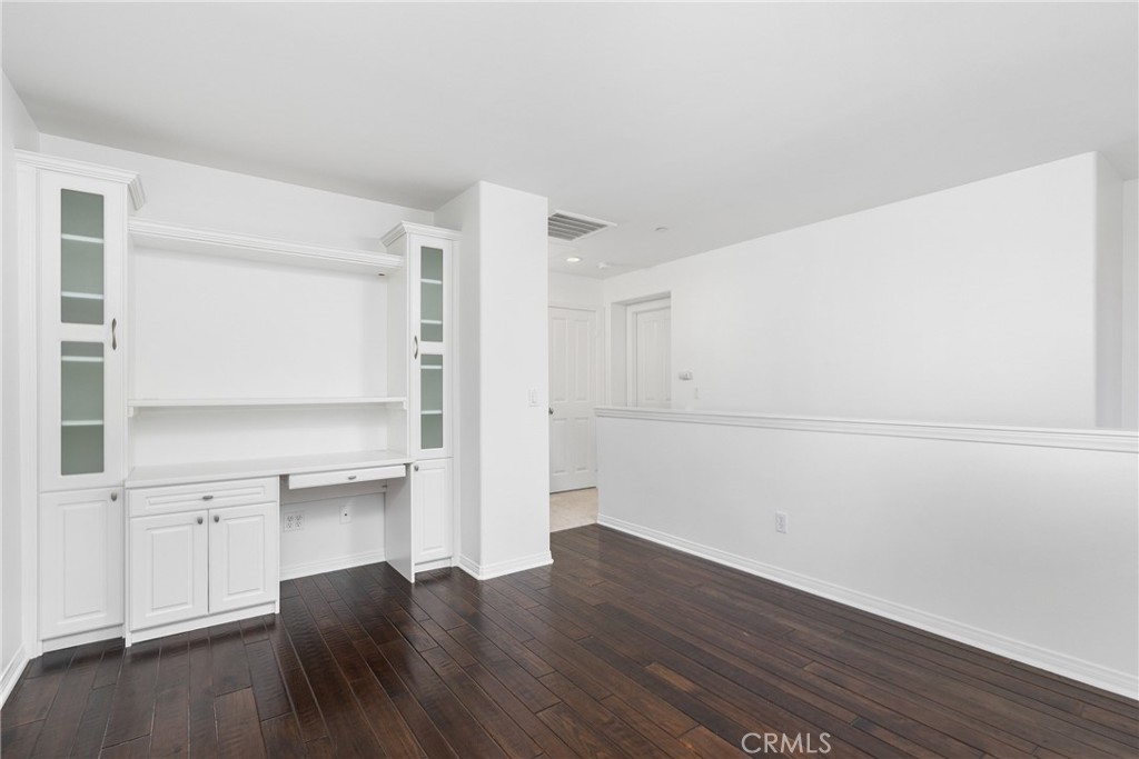74 Clouds Irvine, CA 92603 - Photo 13 of 27 a view of a kitchen with wooden floor and a window