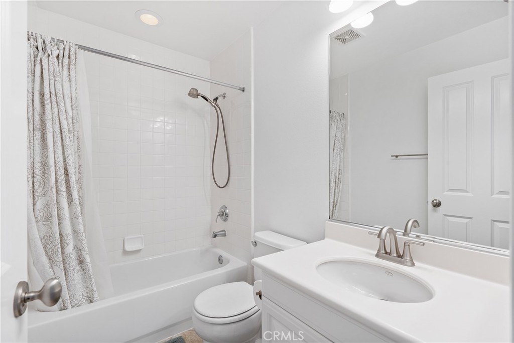 74 Clouds Irvine, CA 92603 - Photo 14 of 27 a bathroom with a sink toilet and shower