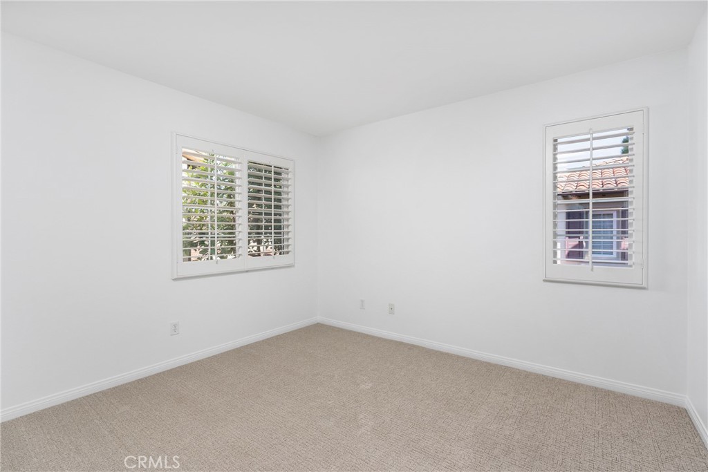 74 Clouds Irvine, CA 92603 - Photo 15 of 27 an empty room with windows