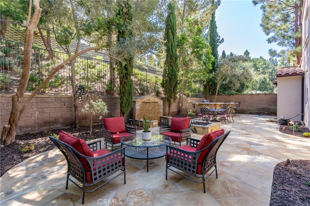 74 Clouds Irvine, CA 92603 - Photo 18 of 27 a backyard of a house with outdoor seating