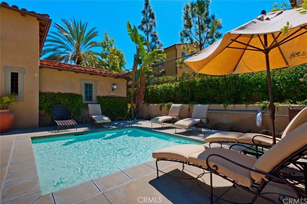 74 Clouds Irvine, CA 92603 - Photo 22 of 27 a view of a backyard with sitting area