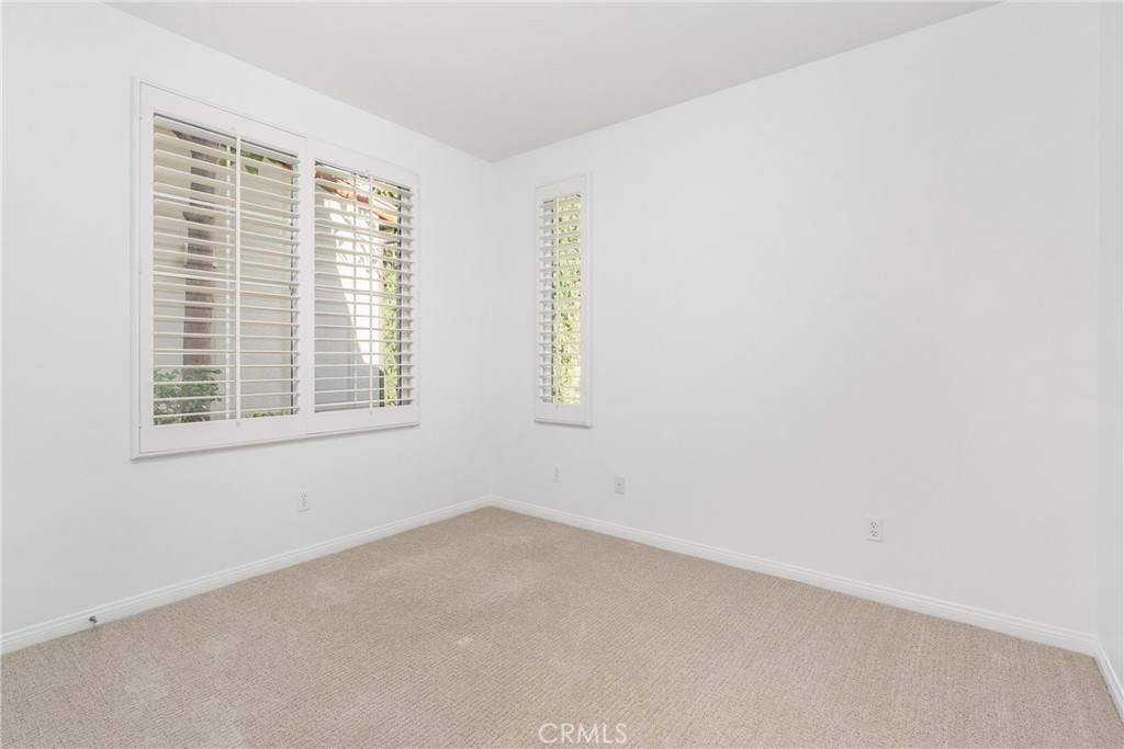 74 Clouds Irvine, CA 92603 - Photo 8 of 27 an empty room with a window