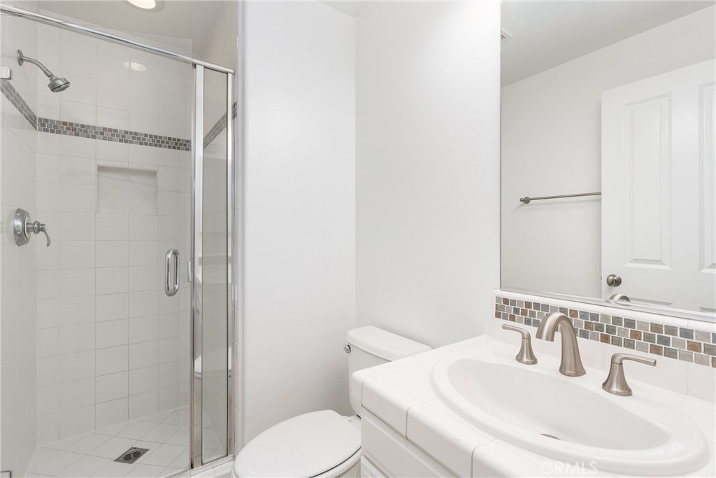 74 Clouds Irvine, CA 92603 - Photo 9 of 27 a bathroom with a sink toilet and shower