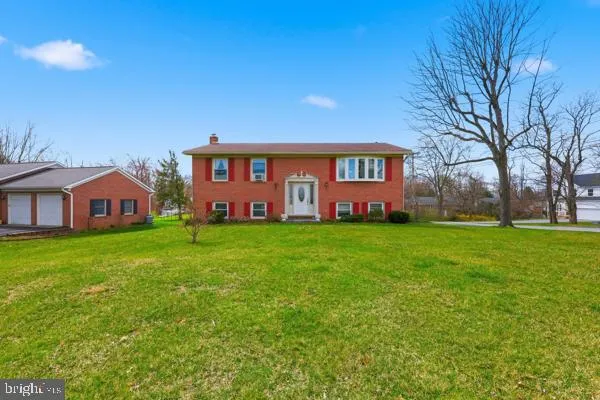 a view of a house with a big yard