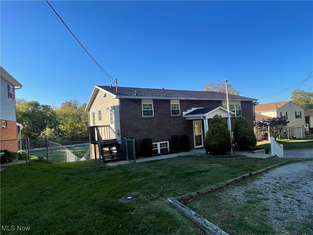 3707 River Road Vienna, WV 26105 - Photo 34 of 35 Back of property with a yard