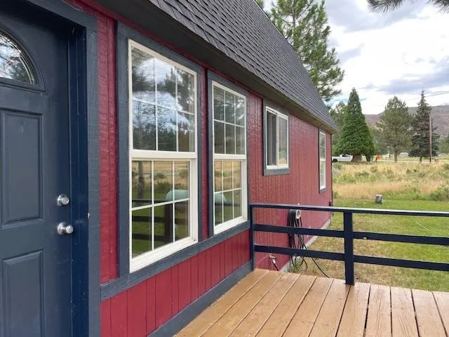 a living room with furniture and a window
